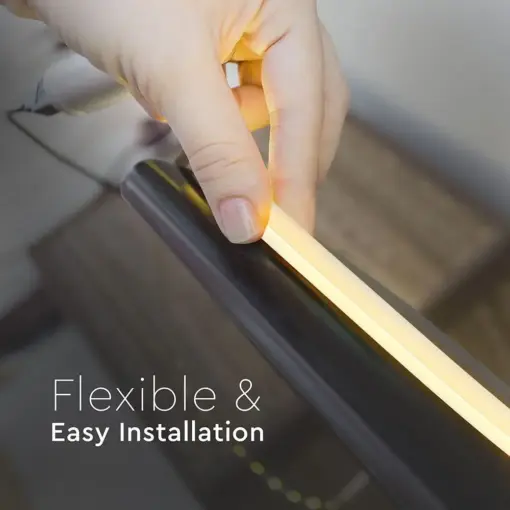 Flexible LED strip installation with hand demonstrating ease of use. Perfect for versatile lighting solutions.