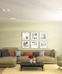 Γωνιακός καναπές με μαξιλάρια σε μοντέρνο σαλόνι, συνδυασμός γκρι και πορτοκαλί αποχρώσεων.