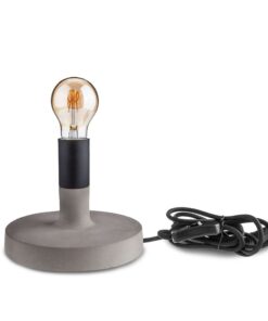 Μοντέρνα επιτραπέζια λάμπα με γυμνό λαμπτήρα και βάση από σκυρόδεμα, ιδανική για minimal διακόσμηση χώρου.