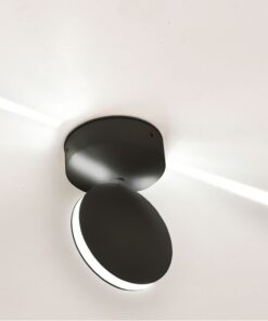 Στρογγυλό μαύρο φωτιστικό οροφής με μίνιμαλ σχεδιασμό και LED για μοντέρνο φωτισμό εσωτερικού χώρου.