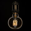 GloboStar® 99060 Λάμπα LED Ultra Thin Soft S Spiral Filament E27 G95 Γλόμπος 4W 280lm 360° AC 220-240V IP20 Φ9.5 x Υ13.5cm Ultra Θερμό Λευκό 2200K με Μελί Γυαλί – Dimmable – 3 Years Warranty